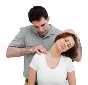 Therapist treating a clients shoulder